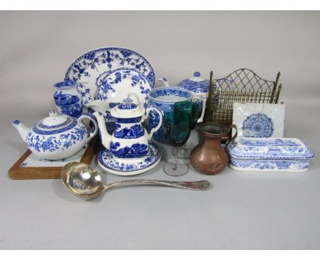 A collection of 19th century and other blue and white printed wares including a rectangular pen box and cover with printed la