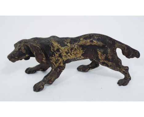 Good cold painted bronze figure in the form of a hound, 13 cm in length 