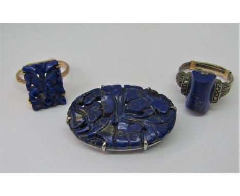 Group of lapis lazuli set jewellery to include a 9ct carved foral plaque ring, a further silver Art Deco style ring and a whi