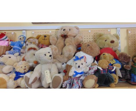 A extensive collection of mixed teddy bears, some Woodrow Bears, including one in a sailors outfit, (one shelf) 