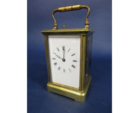 Good quality brass cased repeater carriage clock, twin drive movement striking on a gong, 12.5cm high, key 