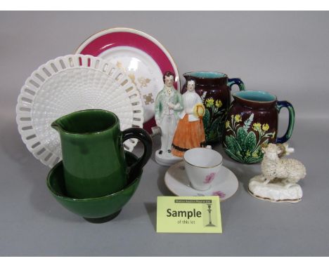 A collection of 19th century and later ceramics including a 19th century Staffordshire figure group of lady and gentleman, a 