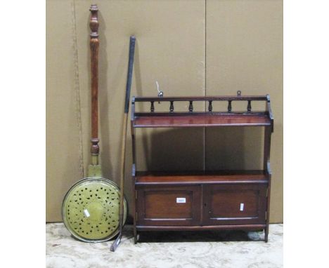 A 19th century brass bed warming pan with pierced lid, together with a hickory shafted golf club/putter, stamped to head "The