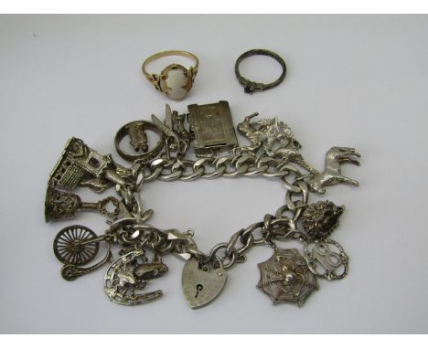 Mixed lot comprising a 9ct cameo ring, silver curb link charm bracelet hung with charms to include a woodpecker, scissors, pe