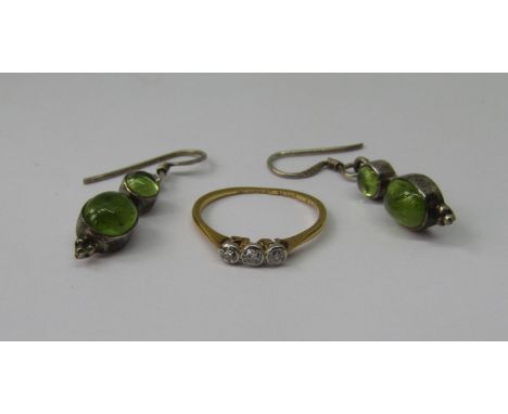 18ct three stone diamond ring, size K, 1.2g and a pair of green gem set silver drop earrings (3) 