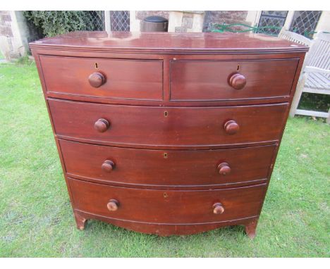 A 19th century mahogany bow fronted bedroom chest of two short over three long graduated drawers with shaped apron and bracke