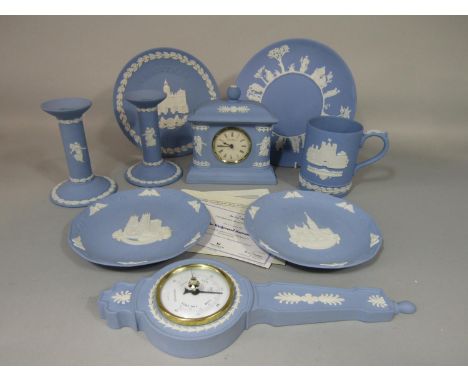 A collection of Wedgwood blue ground Jasperwares including a barometer, a mantle clock and a pair of The Dancing Hours candle