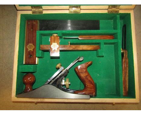 A Faithful cased portable carpentry tool kit comprising plane, square, gauge, chisel, etc 