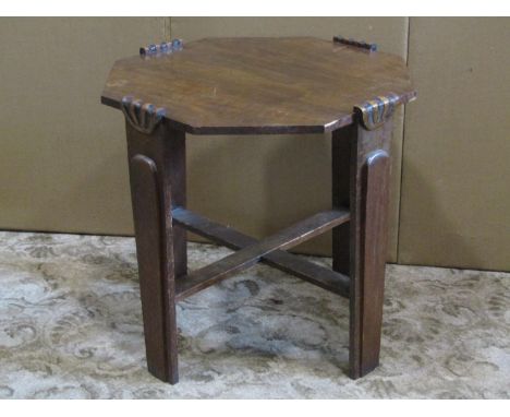 An Art Deco style oak occasional table of octagonal form raised on tapered and moulded supports together with an unusual low 