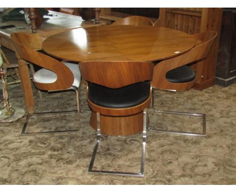 A contemporary modernist/retro style walnut veneered dining table of circular form raised on a cone shaped pillar together wi