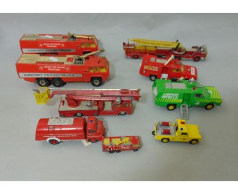 A collection of boxed Corgi Fire Brigade Vehicles including an Airport Fire Brigade Pathfinder, an Aerial Rescue Truck, Simon