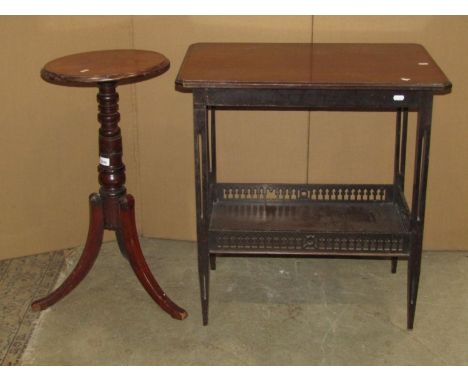 A Regency mahogany pole screen/occasional table base with ring turned pillar and swept supports with ebonised detail beneath 