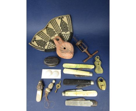 Miscellaneous effects to include an ethnic hat, terracotta lamp, 19th century pen knives, horn work snuff box, etc 