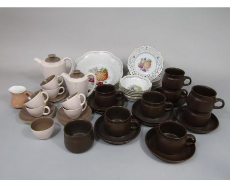 A collection of Poole pottery mushroom glazed wares comprising coffee pot, hot water jug, sugar bowl, six coffee cups, six sa