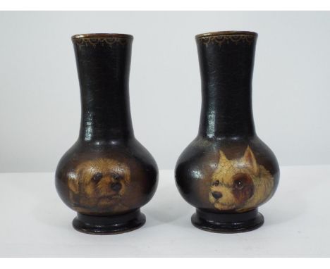 A pair of Victorian papier mache vases with trumpet shaped necks, hand painted panels, showing two terriers, 80cm high 