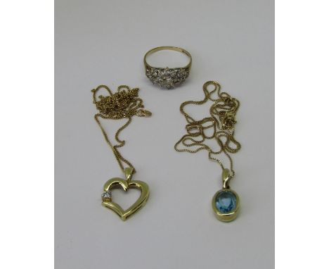 Group of gold jewellery comprising a 9ct blue spinel pendant hung on an associated 10k fine link chain, further 9ct heart sha