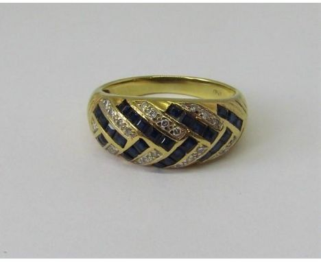 18ct sapphire and diamond bombe ring set with round cut diamond and square cut sapphires, size L, 3.9g 
