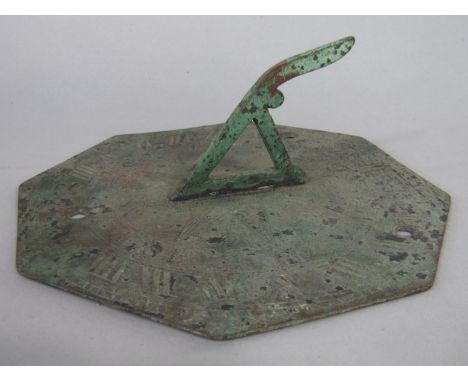 Antique patinated bronze sun dial with indistinct inscribed signature, 15 cm long 