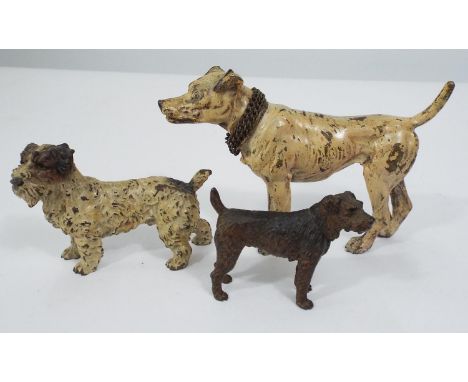 A cold cast cold painted bronze figure of a terrier&nbsp;- indistinctly stamped and a further small cold painted bronze terri