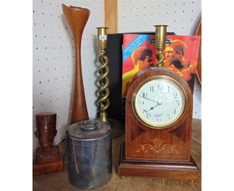 An assortment of interesting items comprising Edwardian lancet clock with convex style, pair of brass open barley stick candl