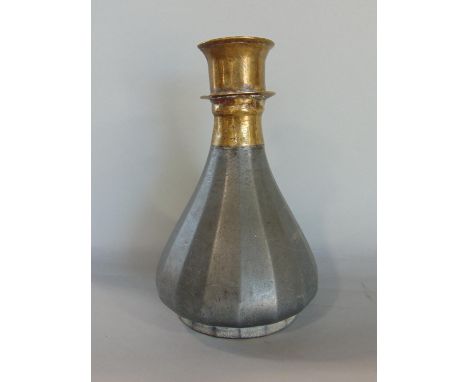 Possibly 17th century Islamic flask with brass spelt and iron/steel bowl with faceted decoration, 23 cm high 