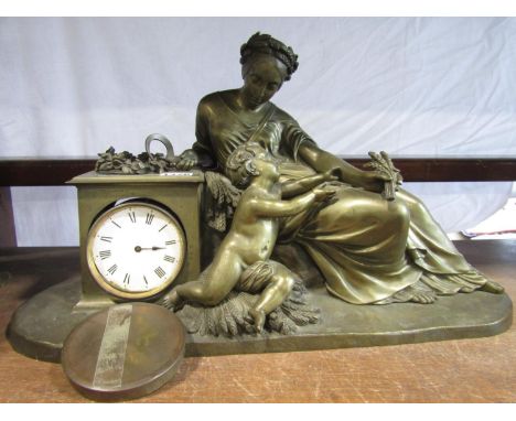 Good quality cast bronze figural mantel clock depicting a  reclined maiden holding scythe and wheat over a playful putti, the