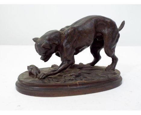 A bronze group showing a terrier ratting on a granary floor, 10cm high 