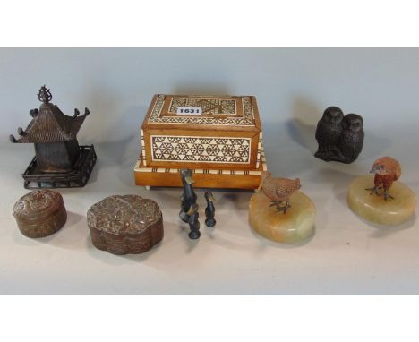 A collection of interesting items comprising a pair of cast metal cold painted birds, a bronze study of a pagoda, a vizagapat