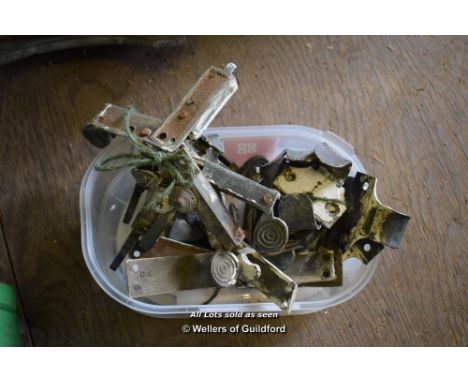 SMALL PLASTIC TUB CONTAINING SASH WINDOW ACCESSORIES