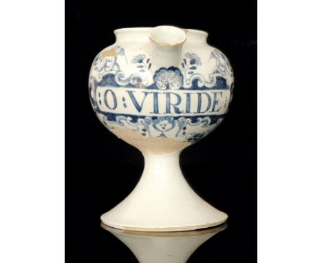 An 18th Century Delft wet drug jar, probably London, painted with the inscription: O:VIRIDE: on a scrolled cartouche centred 