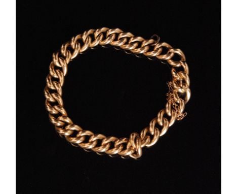 A 15ct rose gold curb link bracelet with concealed clasp and safety chain, weight 21g, length 23cm, stamped 