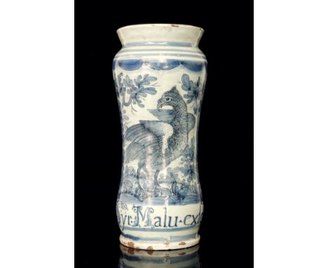 A late 17th Century maiolica albarello, possibly Savona, pencilled in blue and manganese with a detailed bird in a landscape 