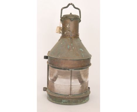 A 19th Century copper naval bulkhead lamp with swing handle height 78cm.