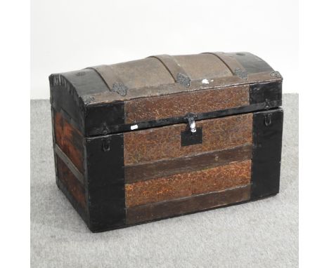 A 19th century iron bound dome top trunk, 77cm