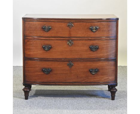 A 19th century mahogany bow front chest of drawers, on turned feet, 98cm