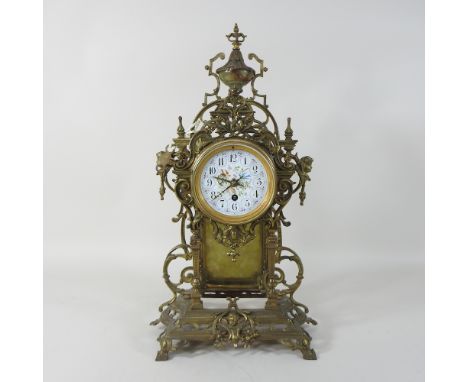 An early 20th century continental brass cased mantel clock, 50cm high