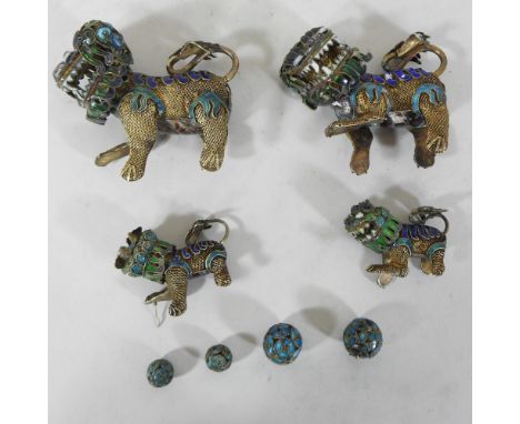 A pair of cloisonne dogs of Fo, 7cm long, together with another pair smaller and other enamel items