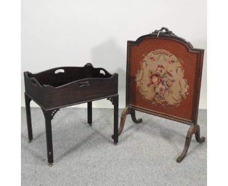 An early 20th century French tapestry fire screen, 60cm, together with a mahogany butlers tray on stand