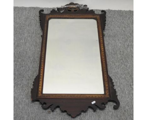 A 19th century Chippendale style fret carved wall mirror, 104 x 57cm