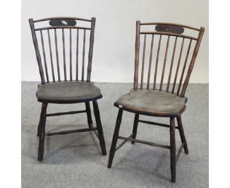 A pair of early 20th century American stick back side chairs