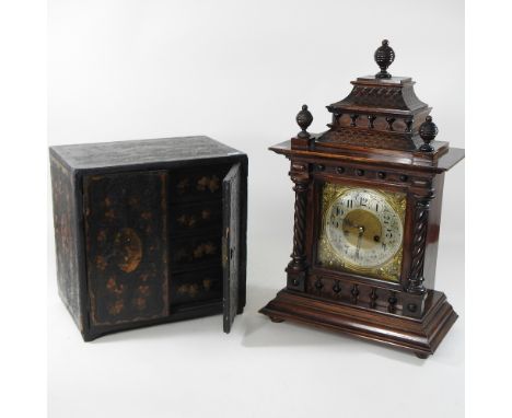 A Victorian walnut mantel clock, 53cm high, together with a lacquered table cabinet