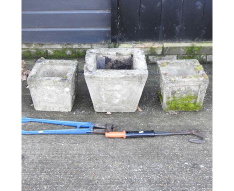 Three reconstituted stone garden planters, together with two hand tools, a side bar cropper, and a nail extractor