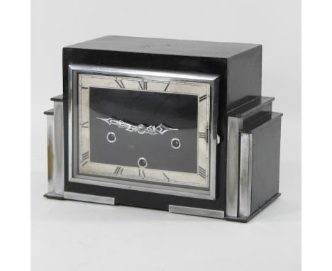 An Art Deco black painted and chrome mounted mantel clock, 29cm