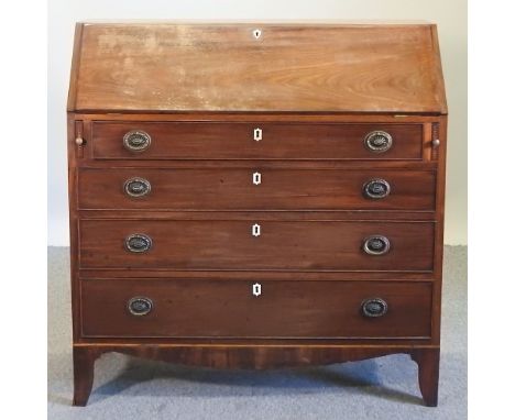 A Regency mahogany bureau, on swept bracket feet, 105cm