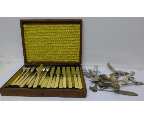 A cased cutlery set with silver ferrules and flatware