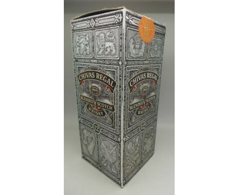 A bottle of Chivas Regal blended scotch whisky, aged 12 years, in a sealed box