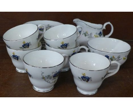 A Royal Sutherland six setting china tea service, six cups, saucers, side plates, sugar and cream, (20)