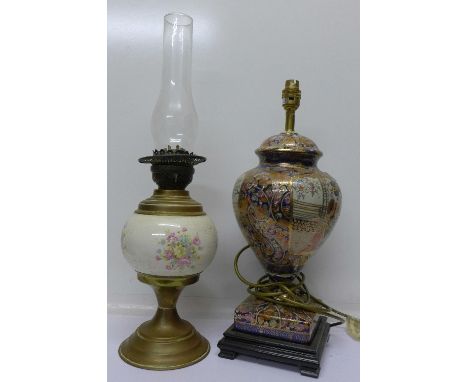 An oriental table lamp base and an oil lamp