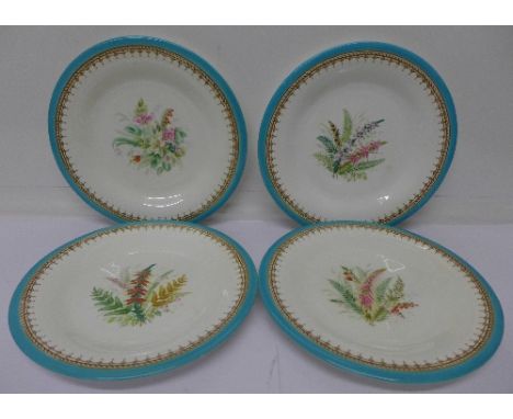 Four floral decorated plates, possibly Worcester, 23.5cm
