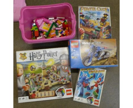 A Lego Harry Potter Hogwarts set, a Lego Pirate Code and Robo Champ set, a Lego Racers Motorbike and a Lego 5585 4+ set